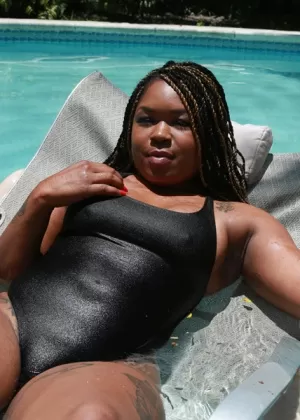 Luscious Ebony babe Diamond showing off her fat booty in a pool