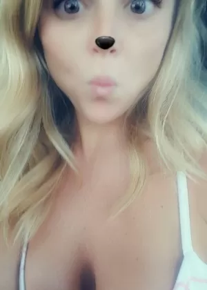 Blonde MILF Madden shops her topless selfie with silly ears and nose