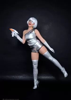 Solo model Pesky Martians sports red lips during a pinup shoot