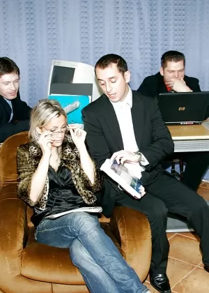 Lusty chick in glasses gets her face glazed with cum after foursome groupsex