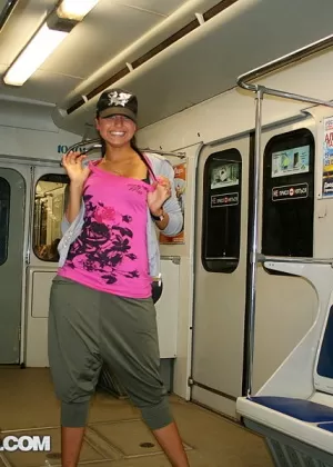 Amateur chick shows her cleavage on a subway before getting naked in a shower