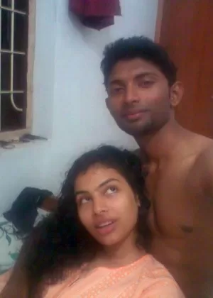 Indian wife listens to music while setting her natural tits free