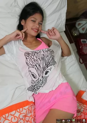 Asian first timer Anabel touts her tight ass after getting naked in her studio