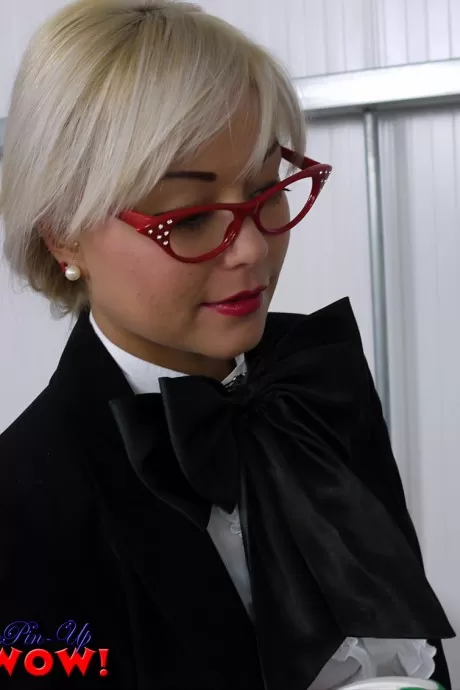 Nerdy Asian model Petra Lily So strips down to her nylons and garters