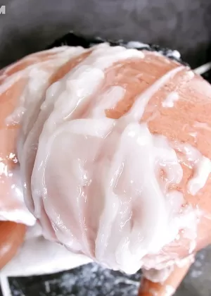 Glamorous MILF performs messy gloryhole scene with a fake cock and jizz