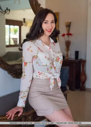 Long legged brunette teen Margaret Clay sports red lips while getting naked